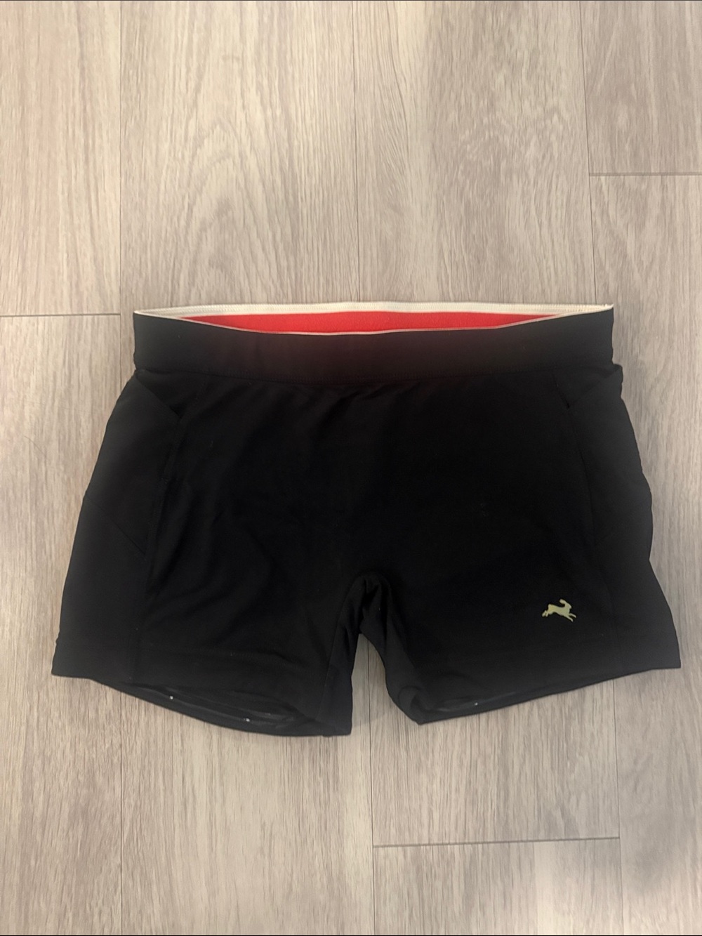 Tracksmith Black running Short tights with Red Waistband Accent and Gold Logo